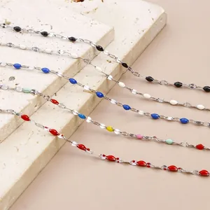 Minimalist stainless steel necklaces with colorful enamel details in five vibrant colors