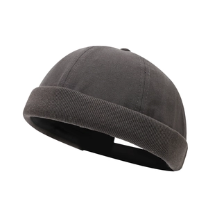 Dark grey canvas docker hat with vintage stitching and adjustable brimless design