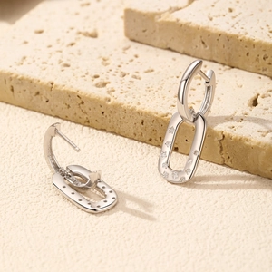 Elegant S925 sterling silver geometric earrings featuring pavé crystals on a stone base