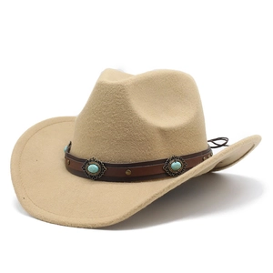 Detail of khaki wool felt cowboy hat with vintage brown leather band and turquoise stone