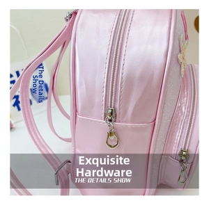 Detail of pink pearlescent girl backpack showing premium silver shaped metal zipper puller