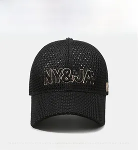 Front view of black mesh baseball cap with NY&JA champagne gold 3D embroidery detail