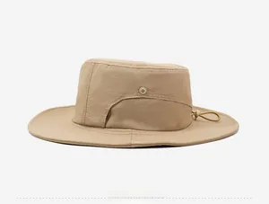 Close-up of quick-dry sun hat with UV protection side snap buttons and adjustable drawcord