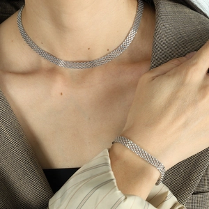 Silver woven mesh necklace and bracelet set in stainless steel for a chic fashion style