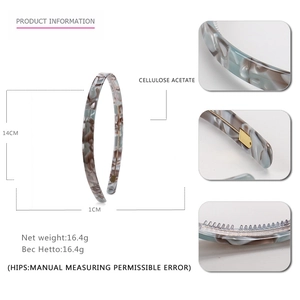 Minimalist geometric acetate headband with taupe marble pattern and size specifications