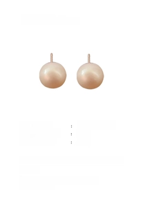 Macro detail of natural baroque pearl earrings with silver posts weighing 4.1 grams