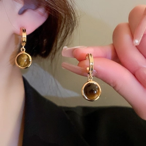 Vintage gold plated hoop earrings with smooth amber tiger eye stone pendants for women