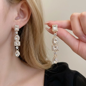 Elegant gold drop earrings with geometric rhinestones and waterdrop pendant for women