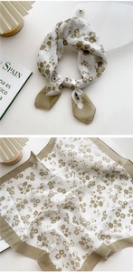 Detail of olive green floral cotton linen square scarf with breathable texture