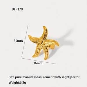 Detail view of 18K gold plated starfish ring with precise 35mm size dimensions