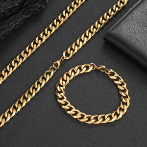 Detail view of 11mm golden stainless steel Cuban link necklace and bracelet set