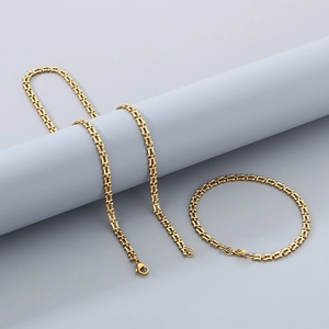 Detail showing 18k gold plated hollow square link watchband chain necklace and bracelet