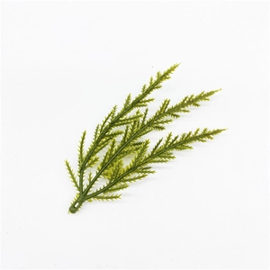 Detailed view of artificial green pine needles for Christmas wreath DIY decoration