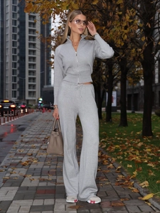 Slim fit light grey knitted tracksuit featuring a zip-up cropped top and wide-leg pants