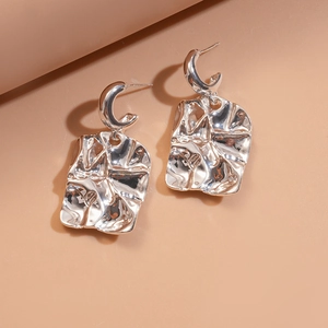 Modern silver C-shaped irregular pleated metal earrings with liquid texture for women