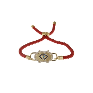 Adjustable red braided Milan rope bracelet with a gold-plated zircon evil eye charm