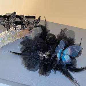 Elegant set with feather butterfly headband and rhinestone tassel hair claw in black