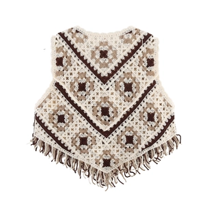 Vintage boho crochet sleeveless knit vest with flower patterns and fringe hem in beige