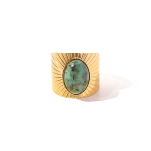 Vintage gold open ring with large oval turquoise stone and sunburst engraving