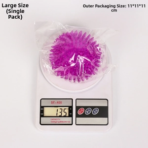 Large purple spiked dog ball weighing 135g with 11cm diameter packaging dimensions