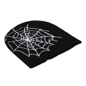 Black knit beanie featuring a white jacquard spiderweb pattern on a clean background