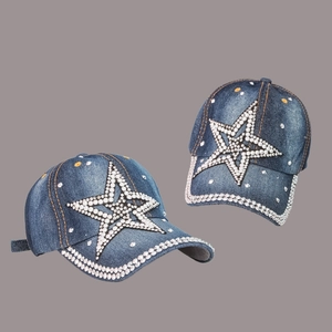 Blue denim baseball cap with rhinestone star pattern and orange contrast stitching