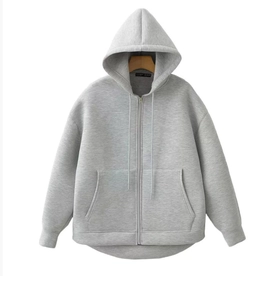 Detail of the high-quality grey zip-up hoodie featuring front pockets and drawstring hood