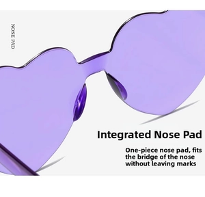 Detail of one-piece nose pads on purple heart-shaped rimless sunglasses for comfort