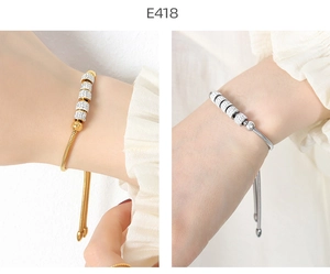 Adjustable snake chain bracelet set in gold and silver finish with pavé crystal accents