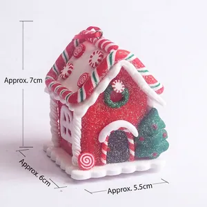 Macro detail of gingerbread house ornament with glitter and dimensions of 7cm height