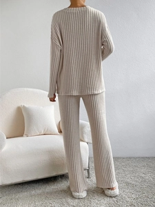 Detailed back view of ribbed knit loungewear set in cream white soft fabric