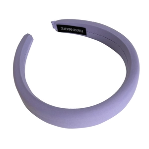 Thick lavender sponge headband with handmade label and textured fabric finish