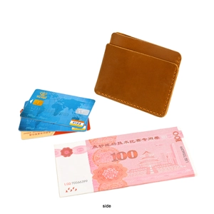 Detail of brown crazy horse leather card holder with handmade stitching and side slots