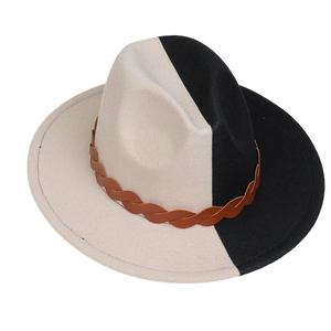 Detail of the two-tone wool felt fedora featuring a stylish brown braided leather band