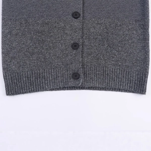 Women's dark grey knit cardigan featuring gold thread stand collar and black buttons