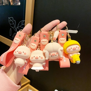 Cute cartoon pig silicone keychains in pink and yellow for bags and car keys