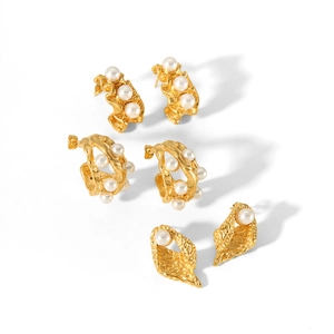 Set of irregular 18K gold plated geometric earrings with white pearls on white background