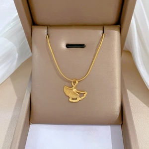 Titanium steel necklace featuring a delicate gold ginkgo leaf pendant on a sleek chain