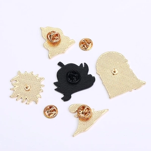 Halloween skull and star metal pin backs with butterfly clutches and rubber backings