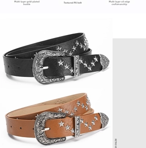 Close-up of retro western belts with silver star studs and engraved buckle detail