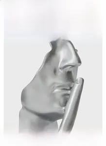 Macro view of matte silver silence sculpture showing fine metallic texture and detail