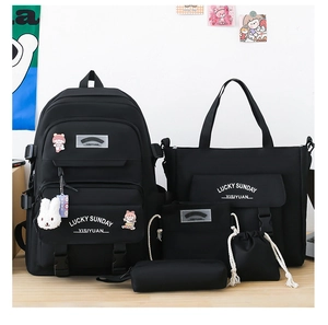 Detailed set of 5 black school backpacks including shoulder bag, pouch and rabbit charm