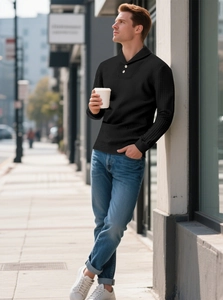 Detail of men's black waffle knit polo shirt showing textured fabric and buttoned collar