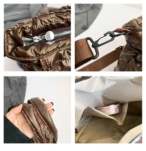 Detail view of brown quilted nylon tote bag with metal zipper and herringbone lining