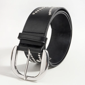 Detail of black leather belt with silver rivets and metal D-ring buckle on white background