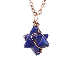 Detail of handmade bronze wire wrapped Lapis Lazuli Merkaba Star necklace pendant