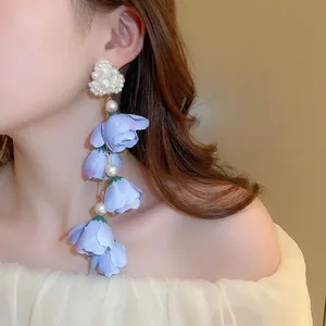 Elegant purple fabric flower tassel earrings with pearls and a heart-shaped stud