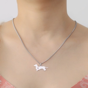 Polished stainless steel dachshund dog pendant necklace with heart cutout for women