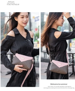 Outdoor shot of a contrast leather crossbody bag with pink flap and dot pattern finish