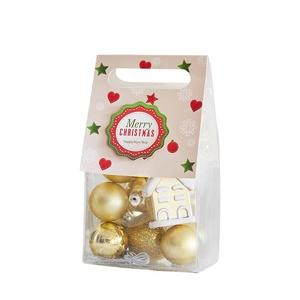 Christmas gift bag set including gold shiny balls and house ornament with festive patterns